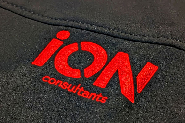 iON Consultants badge on jacket